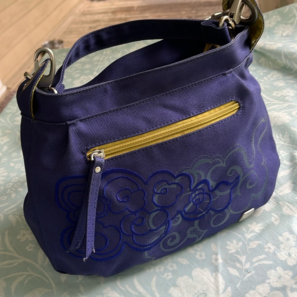 Haiku embroidered detail blue and gold bag